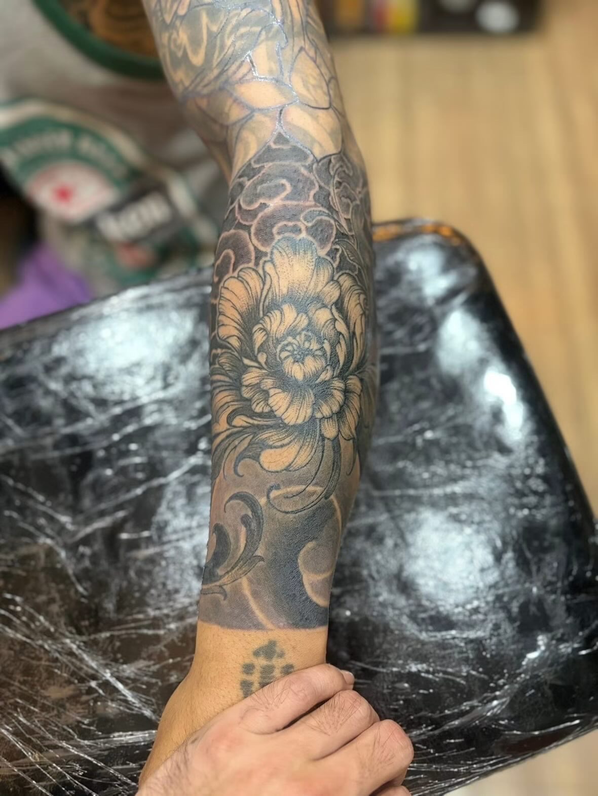 Peony forearm tattoo