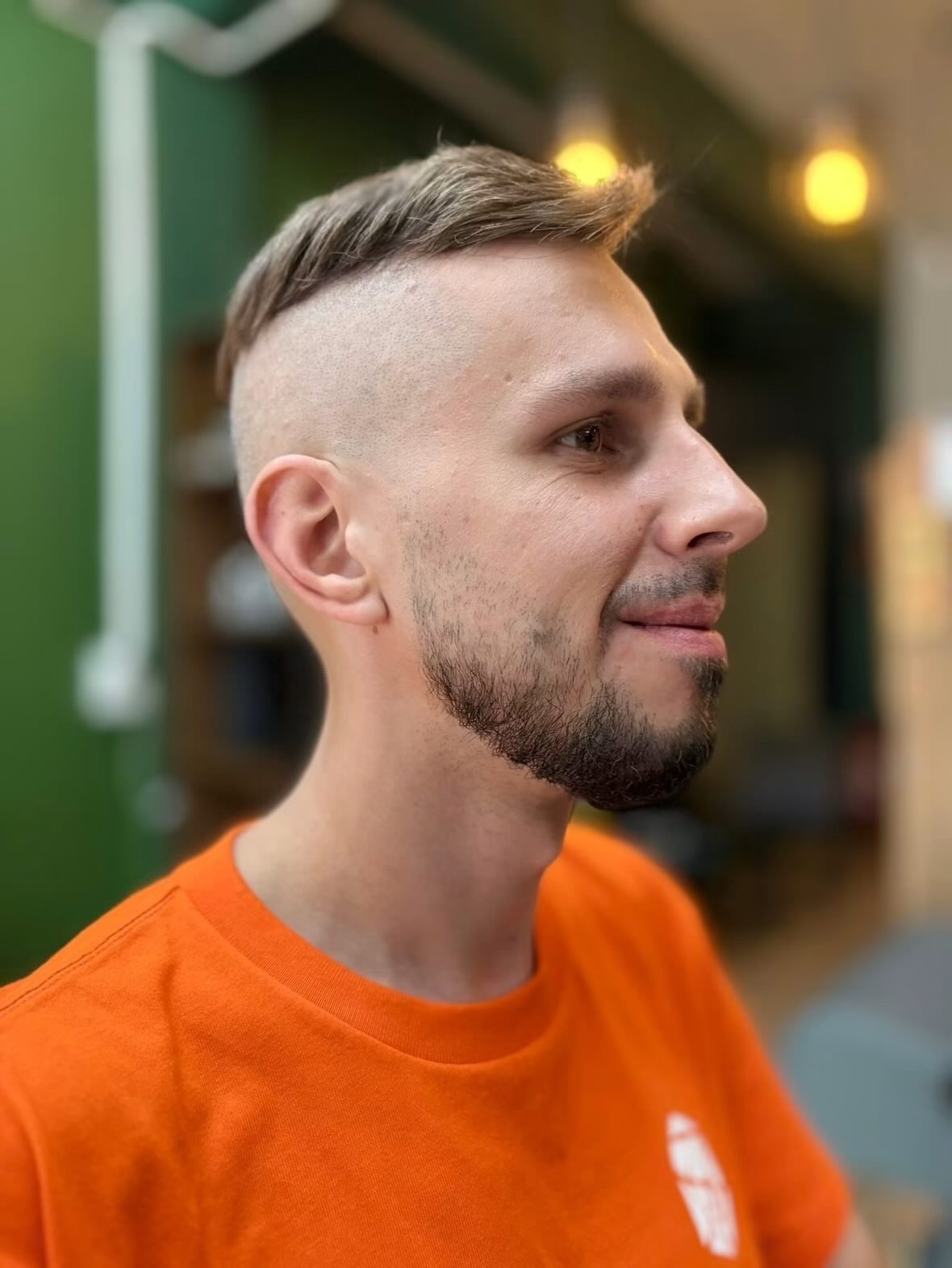 High skin fade with beard line-up