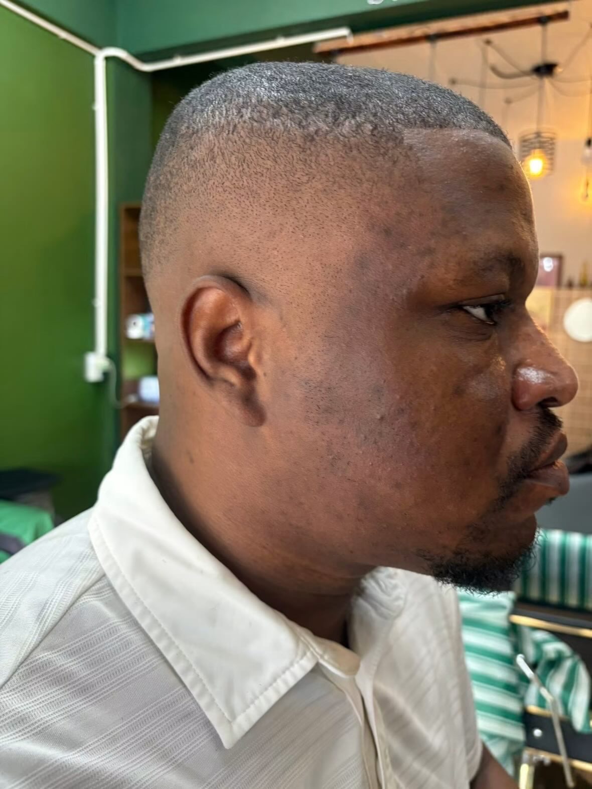 Clean buzz cut with sharp fade