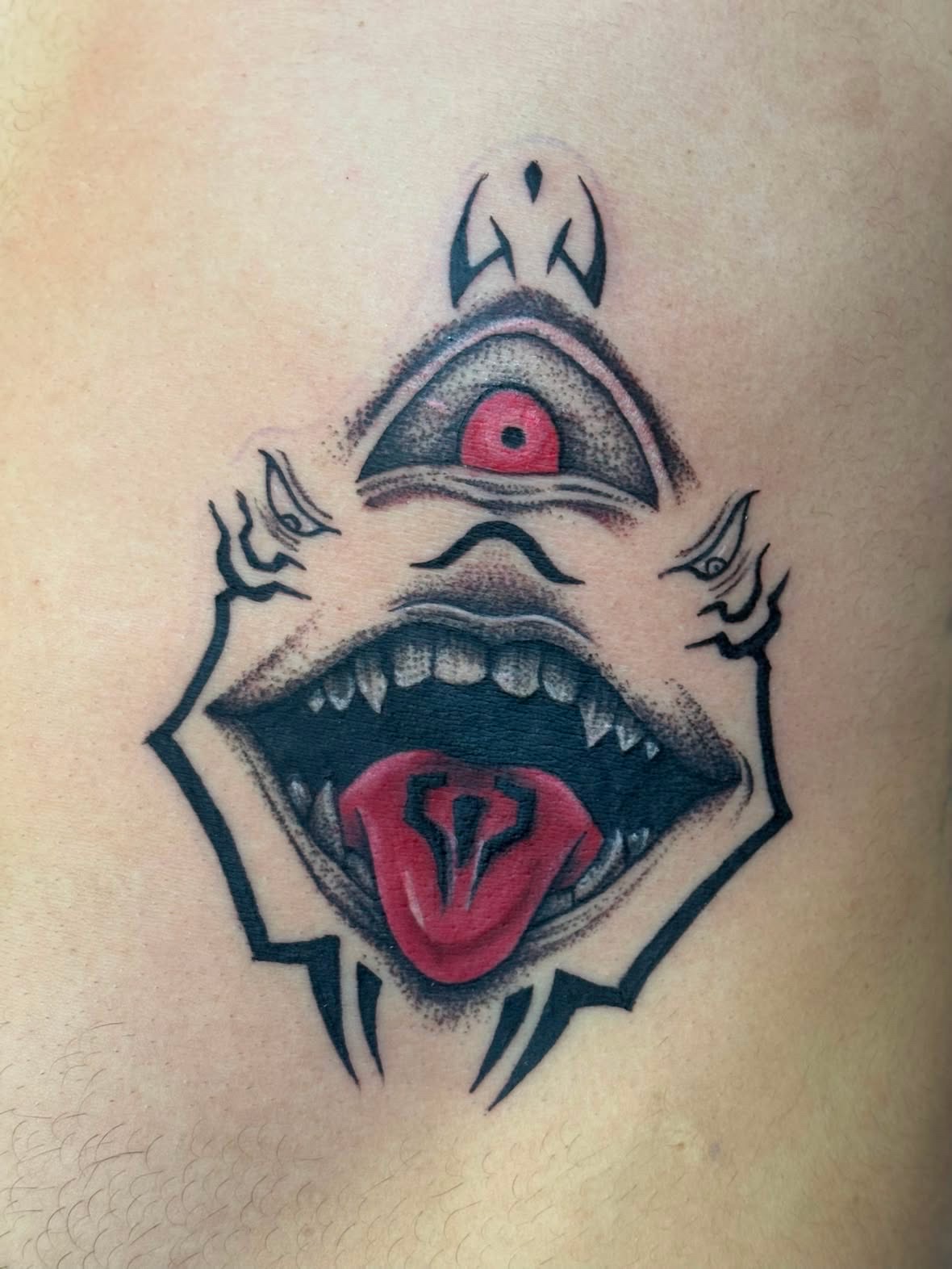 Traditional all-seeing eye tattoo