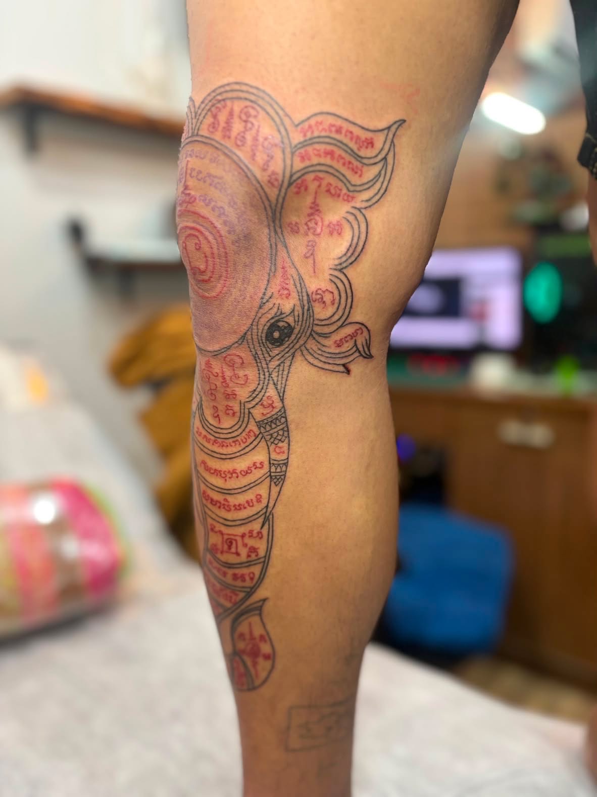 Sak Yant elephant knee tattoo
