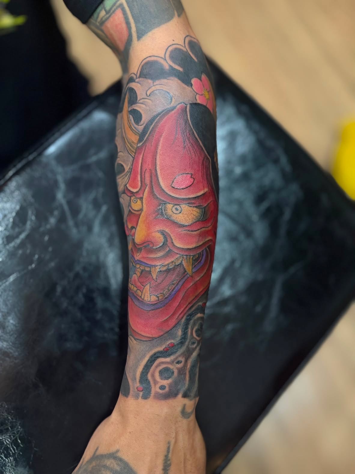 Hannya mask forearm tattoo